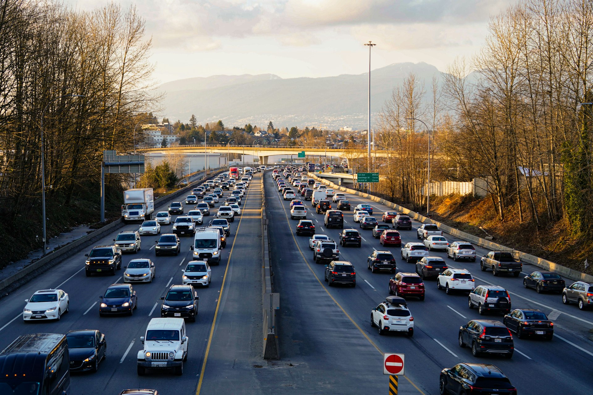 Highway is experiencing heavy traffic with many cars