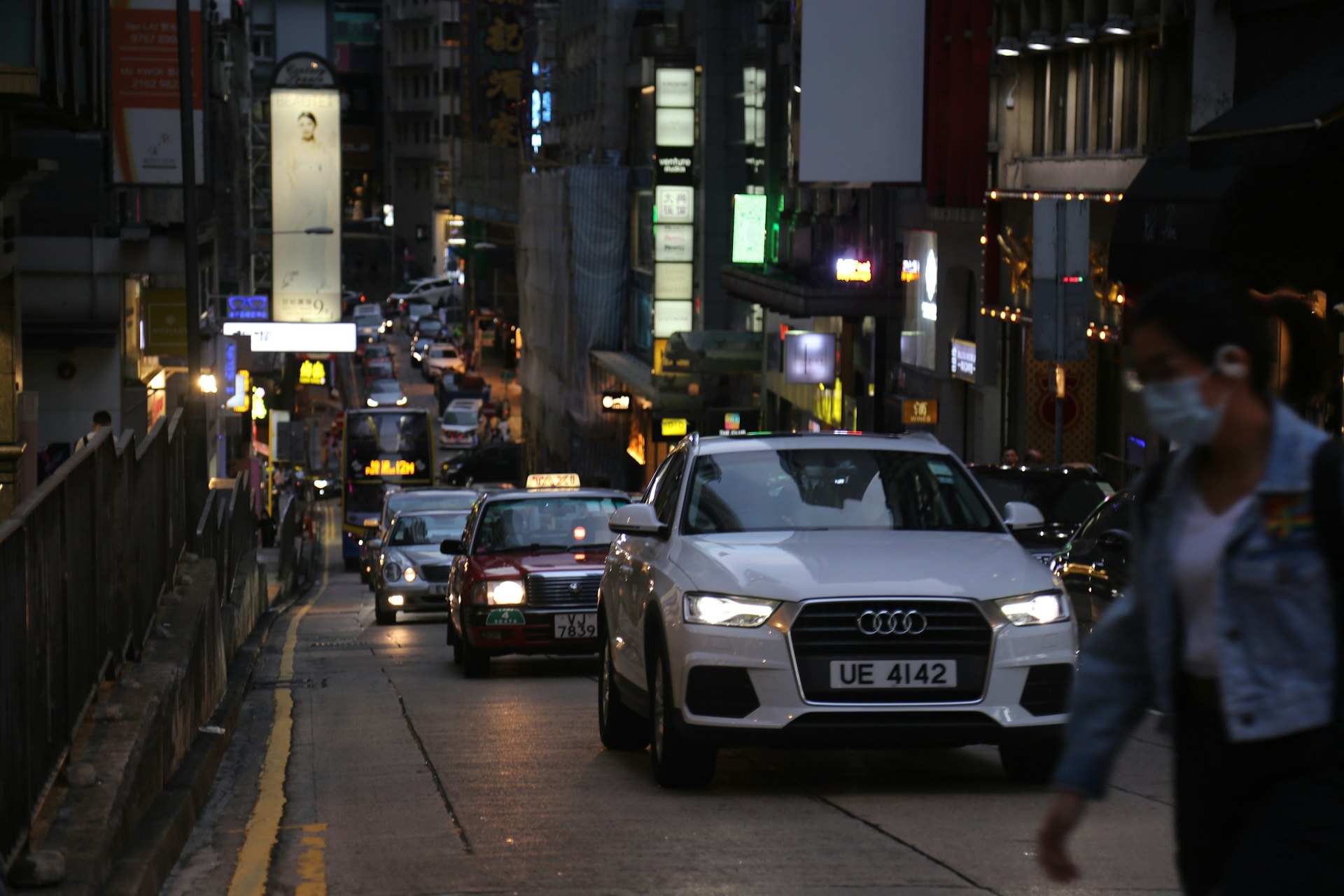 white audi car on road during daytime